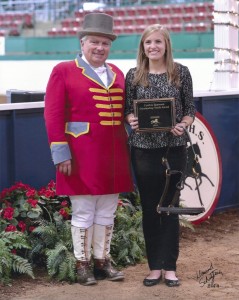 Abbey Lockhart receives the 2014 Outstanding Youth Award from Ringmaster, Billy Whitley